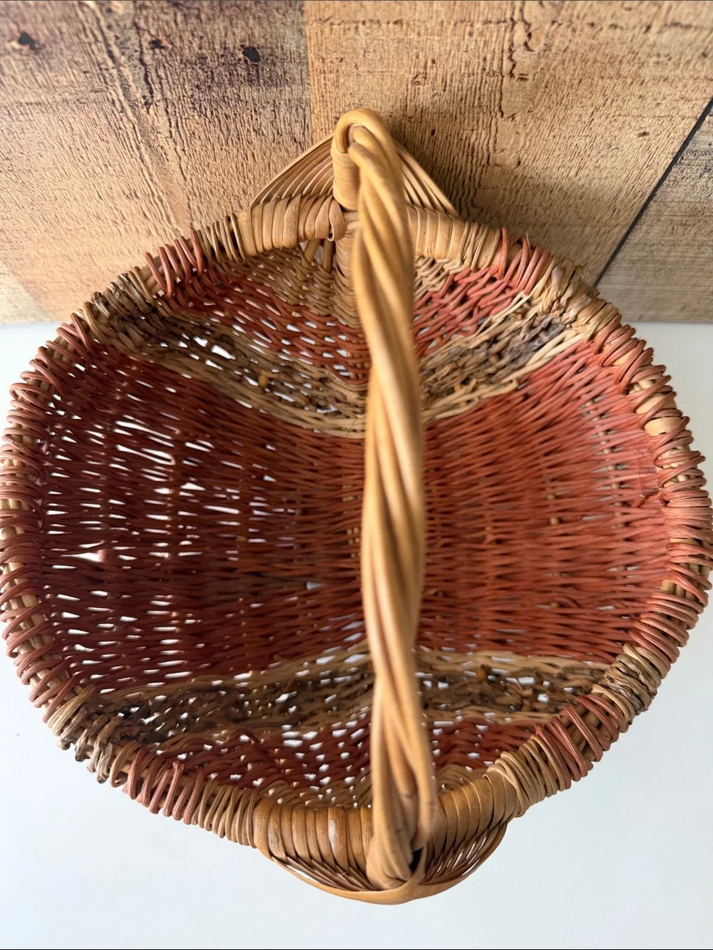 Vintage Primitive Woven Buttocks Basket with God’s Eye in Natural and Terracotta